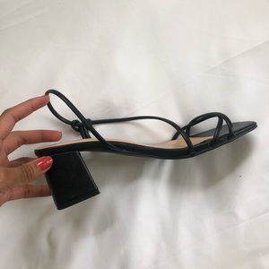 Black strappy low heel sandals